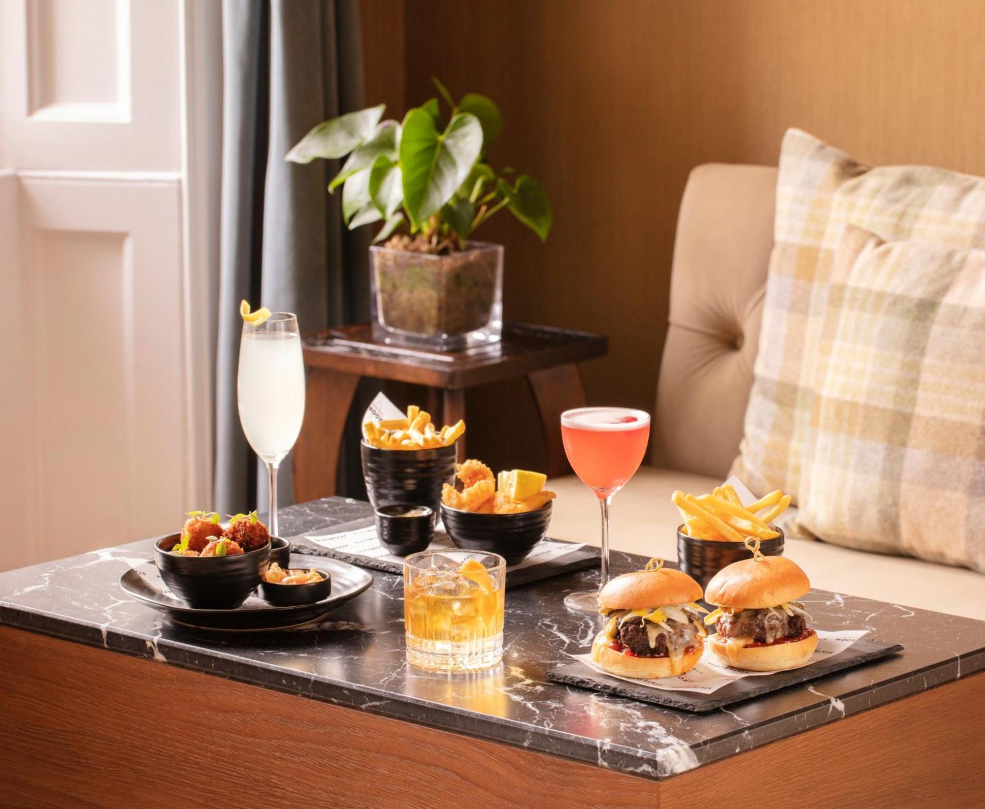 Schloss Roxburghe, Part Of Destination By Hyatt Kültér fotó A selection of cocktails and bar snacks at the bar